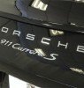 2013 Porsche 911 Carrera 4 Cabriolet Badge